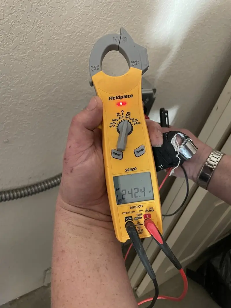 Voltage testing with clamp meter during Generator Installation in Hot Springs